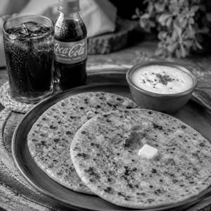 Aloo Paratha (2pcs)+pickle+curd+ Free Cold Drink 250ml