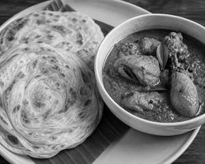 Kerala Paratha With Chicken Curry