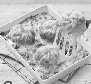 Cheesy Baked Momos