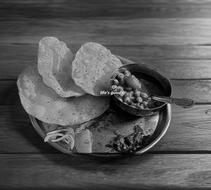 Poori with aloo matar curry