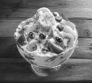 Fruit salad with strawberry ice cream