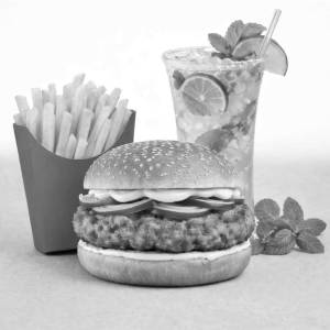 Aloo tikki burger with small french fries and cooldrink