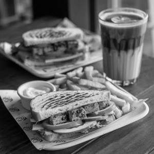 Paneer sandwich with small french fries and cold coffee
