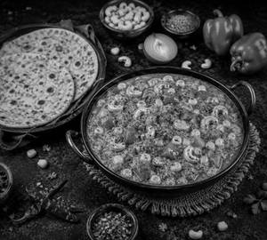 Spicy kaju corn masala +2 paratha + 1 Papad