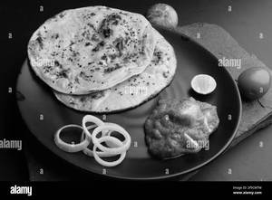 2 Tandoori Roti With Paneer Butter
