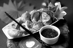 Veg Fried Momo With Manchurian Sauce (8 Pcs)