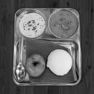 Idli [1 piece] with vada [1 piece] and sambhar