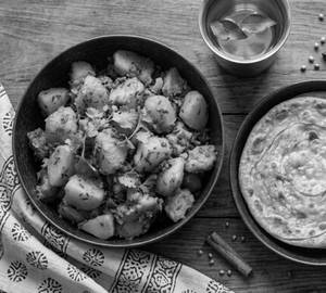 Aaloo Sabji [ Dry ] And 2 Paratha Combo