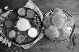 Rice Unlimited, 6 Poori, 2 Veg, Sambar, Korma, Rasam, Curd, Sweet (As Per Availibility), Pap, pa