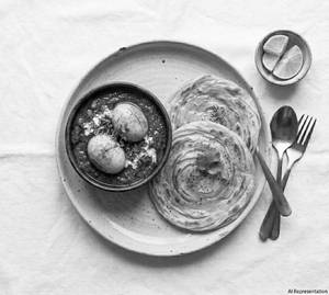 Egg Curry 2 Piece + 2 Lacha Prantha