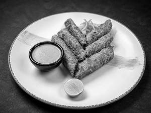 Murgh Gilafi Seekh Kebab