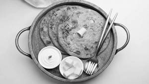 Jumbo Paneer Pyaaz Paratha + Dahi + Butter