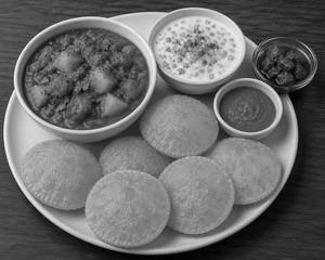 Aloo Tamatar + Poori [6 Pieces] + Raita + Pickle
