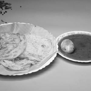 Parotta Egg Curry Combo