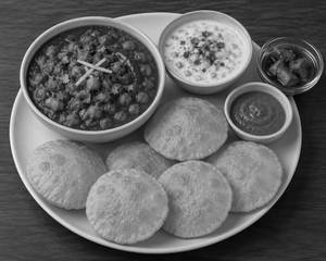 Jeera Aloo + Poori [6 Pieces] + Raita + Pickle