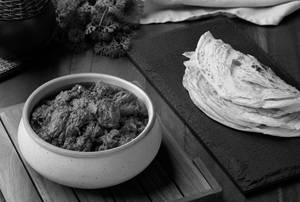 Kerala Parotta (2 Pcs) With Chicken Roast