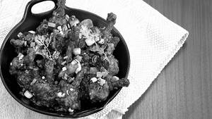 Black Pepper Tossed Lollipops