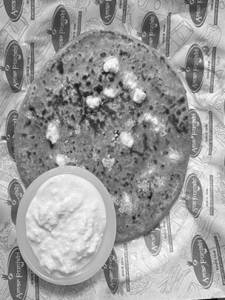 Tawa Paneer Parantha With Curd