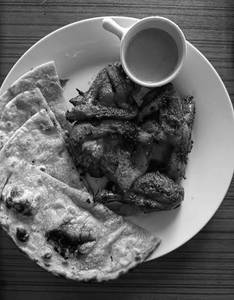 Chicken platter with 2 roti