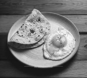 Butter Egg half Fry [Half] + Tava Roti (2 pieces)