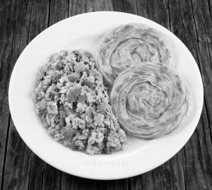 Egg Kalakki + Parotta (2 pieces)
