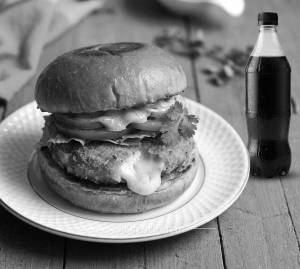 Cheesy Aloo Tikki Burger + Cold Drink 750Ml