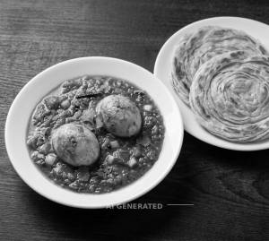 Egg Curry [2 Eggs] + 2 Lachha Paratha