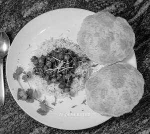 Chole Chawal + Extra Bhature (2 Pieces)
