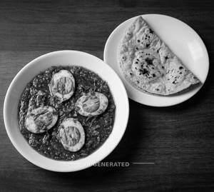 Egg Curry + Tawa Roti (1 Piece)