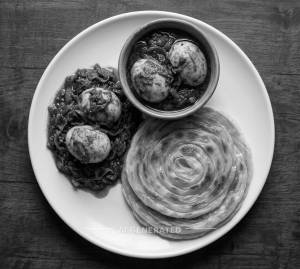Egg Roast + Essence Parotta (1 Piece)