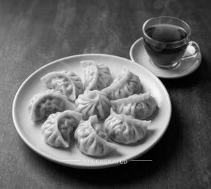 Pork Momos Steamed + Black Tea