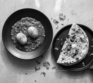 Egg Curry [2 Eggs] + Butter Tandoori Roti [1 Piece]