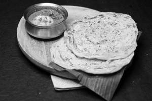 Kerala Parotta + Egg Curry Combo
