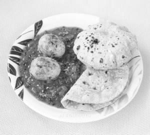 Egg Curry + Pulka (2 pieces)