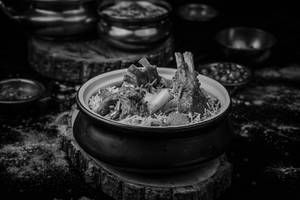 Dum Mutton Biryani Served With Raita & Salad