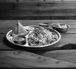 1 Poha with Samosa [1 Piece]