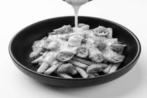 Crispy Chicken N French Fries In Molten Cheese Sauce