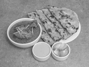 Chicken Curry [2 Pcs] + Butter Roti [2 Pcs]