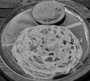2 malabar parota with alu curry 