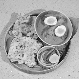 Bhopali Murgh Rezala Saffron Warqi Parantha