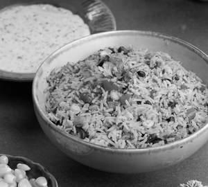 Mexican Rice with Cheesy Herb Sauce
