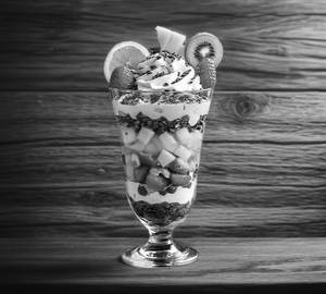 Fruit salad with chocolate ice cream