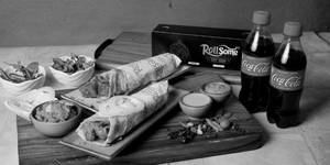 Chaap Butter Masala Roll + Chilli Paneer Roll + 2 Coke (250 Ml)