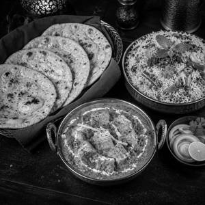 Paneer Lababdar With 4 Butter Roti With Veg Biryani