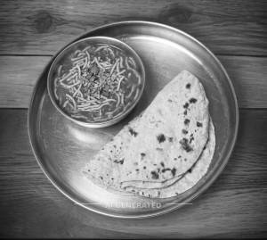 Sev Tamatar + Plain Roti (2 pieces)