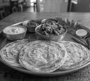 Parotta With Boti Gravy