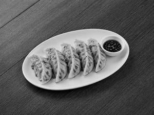 CHILLI GARLIC DUMPLING