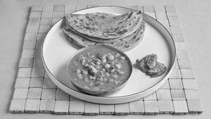 Chole & 2 Wheat Tawa Paratha