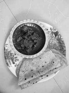 Rehu fish curry with tawa roti