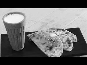 2 Aloo Pyaaz Paratha with Sweet Lassi